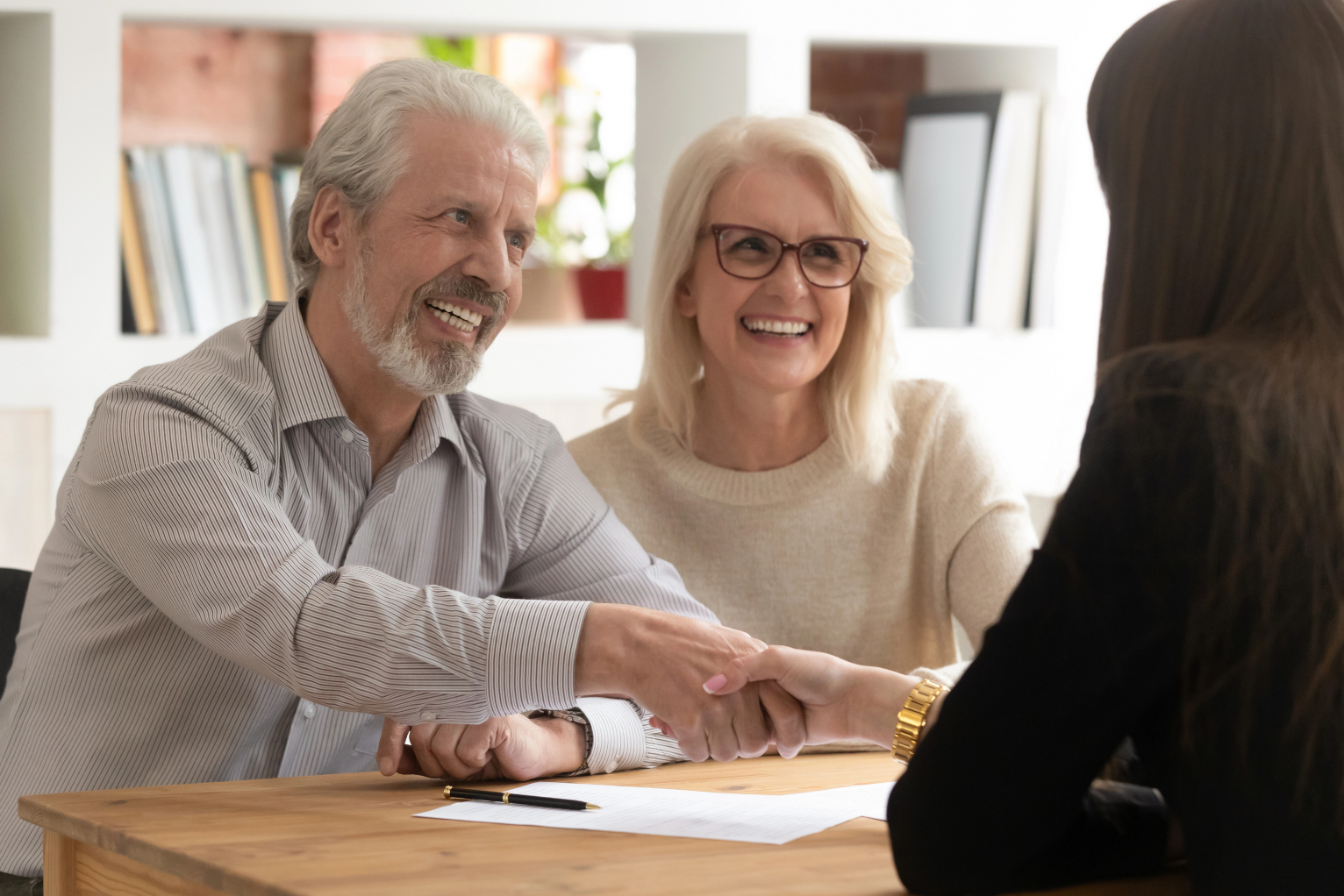 Couple Greeting Hand with Attorney